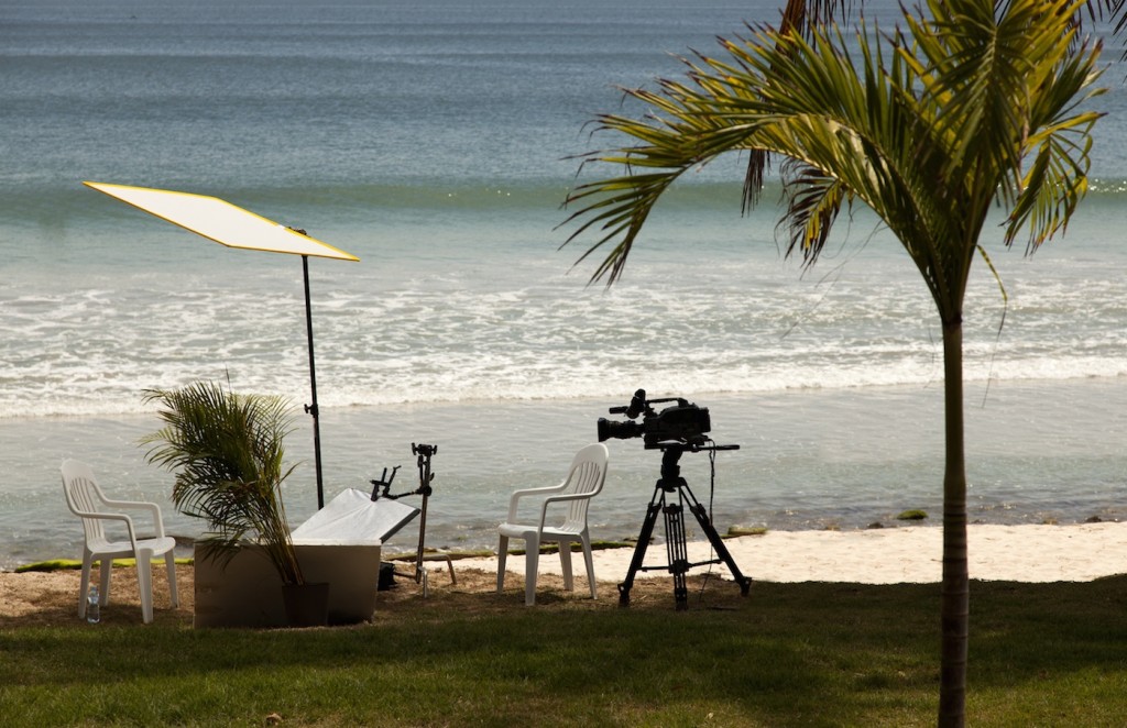 Video cameraman working with his professional equipment